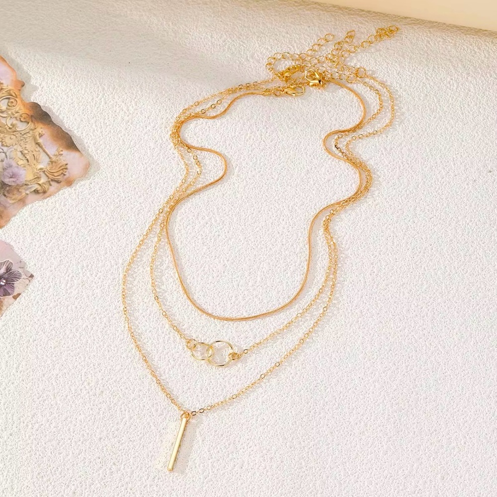 Gold Layered Necklace Set with Three Chains and Pendants - Picture 3 of 4
